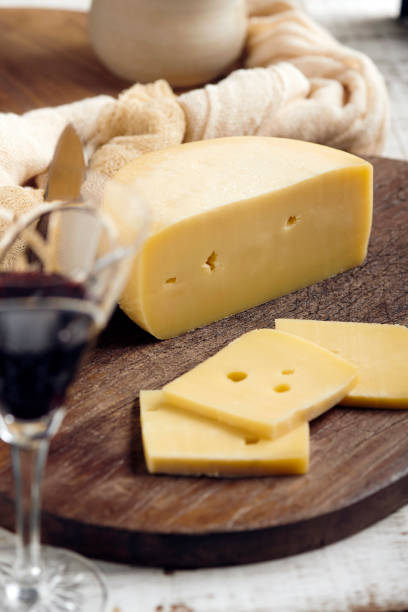 Piece of tasty Ossau-Iraty or Esquirrou sheep cheese produced in south-western France, Northern Basque Country