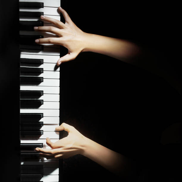 istock Piano keys pianist hands playing keyboard 2011092714