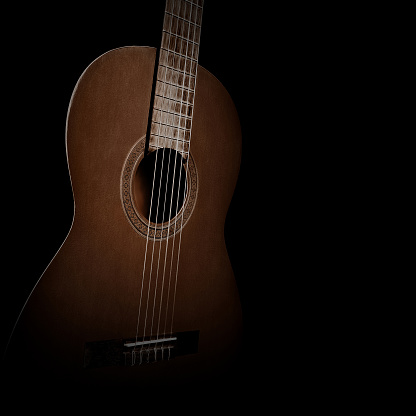 Acoustic Guitar classical musical instrument on black