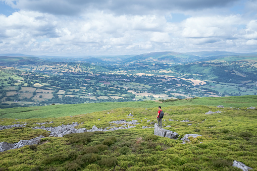 Hiker Backpacker on the mountain of Abergavenny, wales, England, summer outdoor