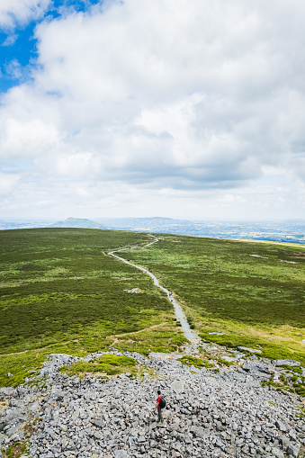 Hiker Backpacker on the mountain of Abergavenny, wales, England, summer outdoor