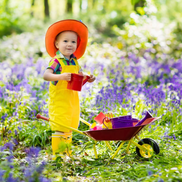 istock Kids in bluebell garden 2011205575