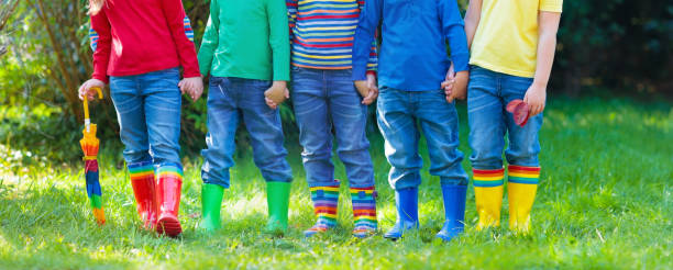 istock Kids in rain boots. Rubber boots for children. 2011220069