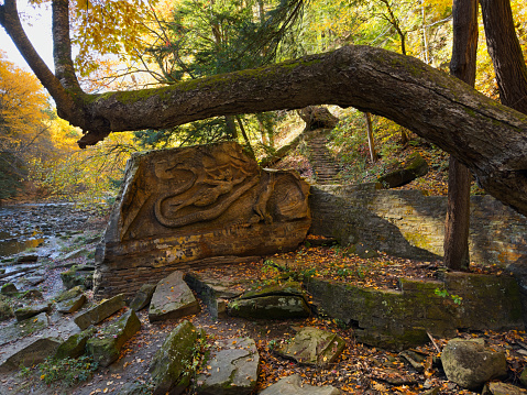 The Henry Church Rock in the South Chagrin Reservation by the Chagrin River. The rock face was sculpted by Henry Church in 1885 and shows a serpent encircling a woman.