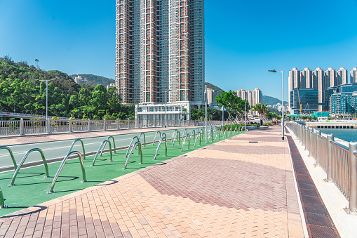 View of a Tseung Kwan O waterfront promenade under blue sky