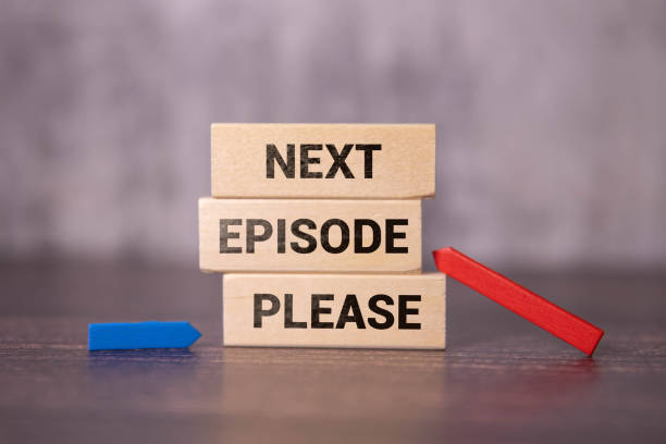 istock Next Episode Please text on hand drawn web browser paper on desk. Binge-watching shows concept, selective focus 2011387363