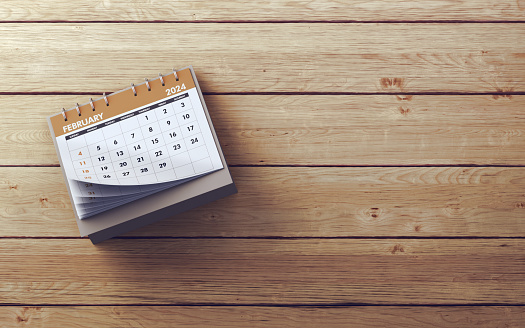 3d render February 2024 Calendar sitting on Wooden background, Can be used for reminder day, special day concept (Close-Up)