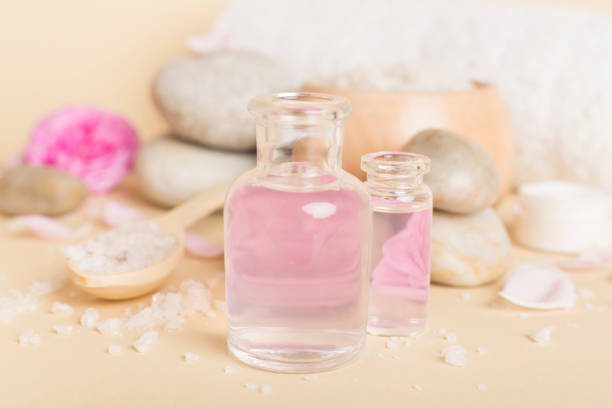 istock Spa composition with pink roses on wooden table 2011412540