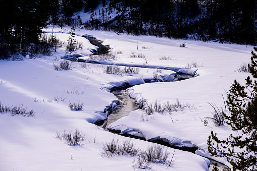 A river landscape covered in fresh snow.