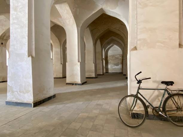 istock Bicycle resting on the arcades of the Kalyan mosque complex in Bukhara 2011431664
