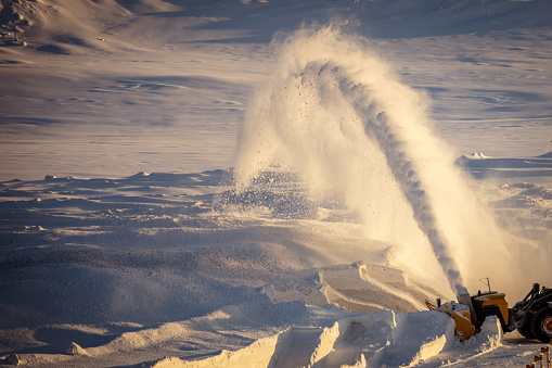 Snow blower vehicle is working on the snow.
Hammerfest - Norway.