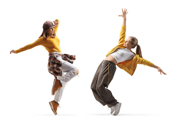 Full length shot of two young women dancing Full length shot of two young women dancing isolated on white background dancer stock pictures, royalty-free photos & images