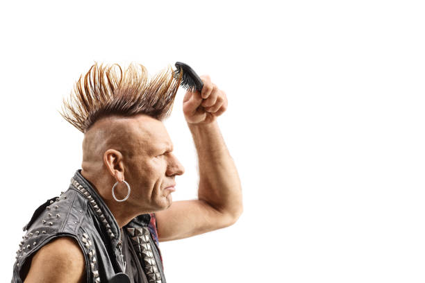 istock Punk with a mohawk combing his hair 2011587338