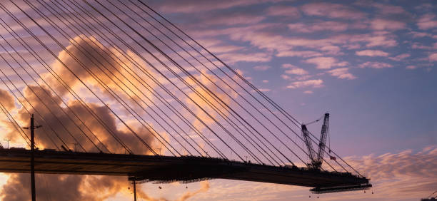 The Gordie Howe International Bridge, is expected to be fully constructed and open for business by 2024/2025.   The bridge will link Detroit, Michigan with Windsor, Ontario.