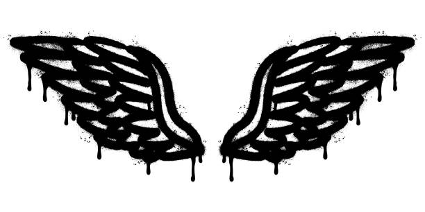 spray painted graffiti wings sprayed isolated with a white background. graffiti wings with over spray in black over white. vector illustration - blob black splattered spotted点のイラスト素材／クリップアート素材／マンガ素材／アイコン素材