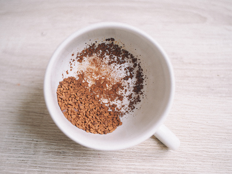 Adding cocoa to the bowl