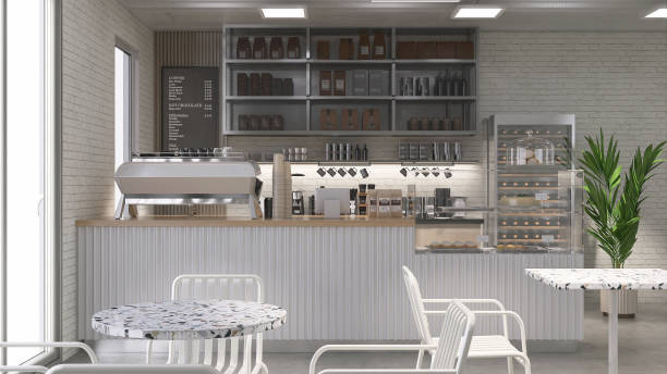 istock White table and chairs in modern loft, white brick wall cafe and bakery shop with counter, professional espresso machine, cake display fridge 2011657431