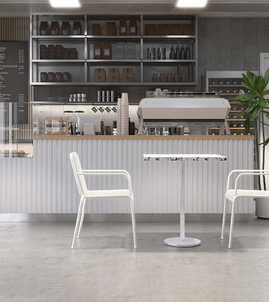 White table and chairs in modern loft, white brick wall cafe and bakery shop with counter, professional espresso machine, cake display fridge for coffee shop, bistro interior design decoration 3D