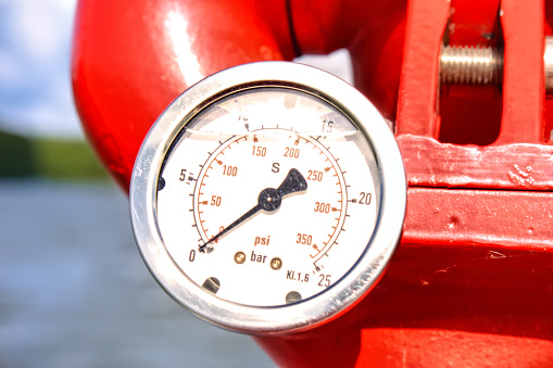 A pressure gauge on a water cannon in a fireboat