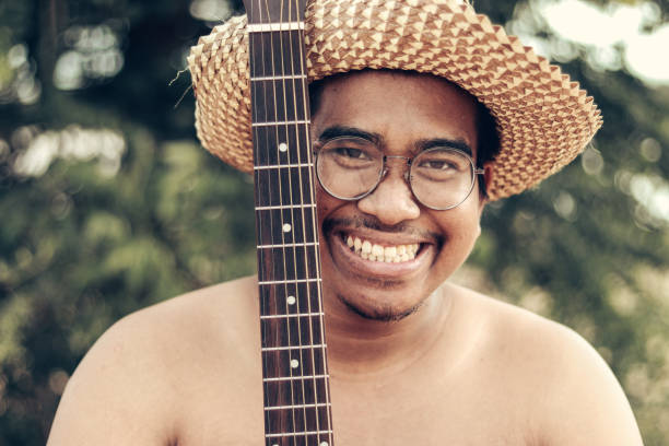 istock cute male musician 2011718933