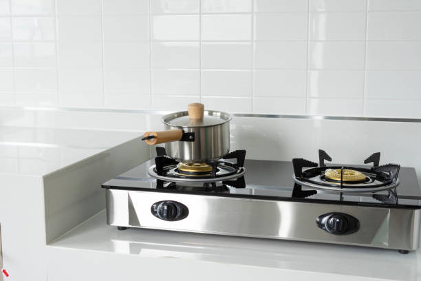 istock Metal Pot on induction hob in modern kitchen. 2011729504