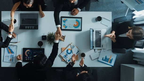 istock Top view of manager present growth graph while team shaking hand. Directorate. 2011745226