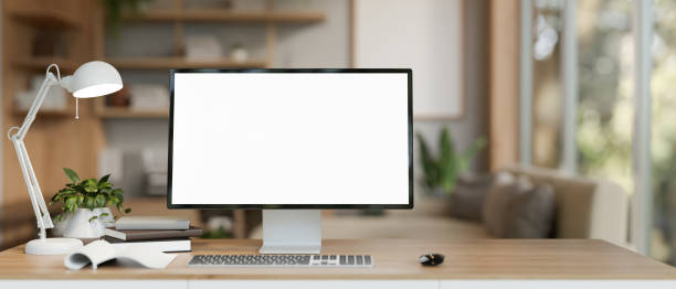 istock A modern and comfortable CEO's office or home office with a computer mockup on a wooden table. 2011765973