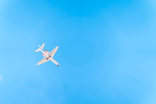 istock Airplane Cessna 680 before landing in blue sky. 2011780205