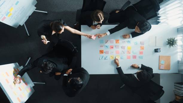 istock Top down view of business group sharing and brainstorming idea. Directorate. 2011792068
