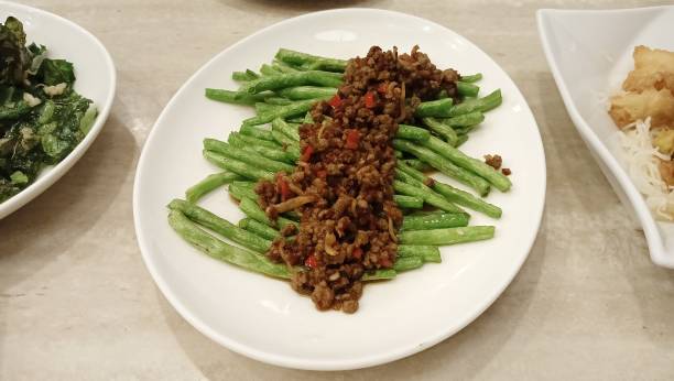 istock buncis cah daging sapi .Stir-fried Baby French Beans with Minced Beef. Chinese Style Dishes. 2011806177