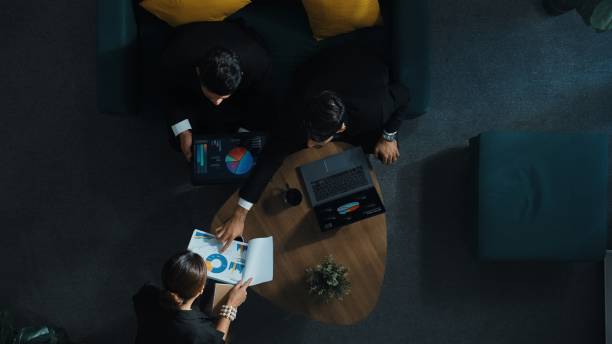 istock Top view of smart business team analyze data while point at chart. Directorate. 2011810812