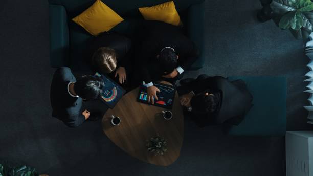 istock Top view of team looking at graph while smart manager join meeting. Directorate. 2011817758