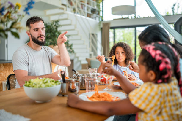 istock Multiracial Family Sharing a Homely Meal 2011900104