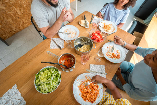 istock Intercultural Family Gathering for a Cozy Home-cooked Meal 2011900117