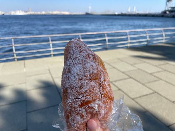 istock Old-fashioned fried bread eaten by the sea 2011900499