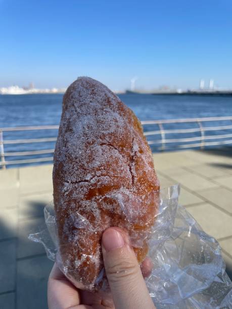 istock Old-fashioned fried bread eaten by the sea 2011900502