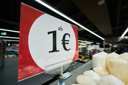 Reference to a special offer with a sign in a store with the German inscription ab 1€