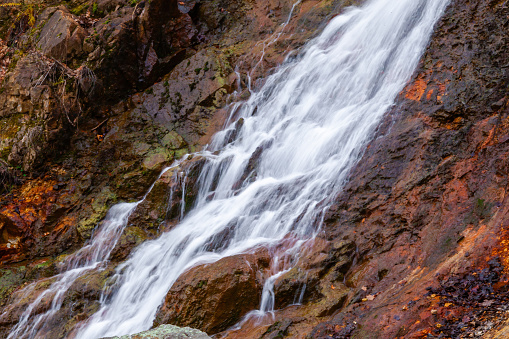 Scenic waterfall in slow motion flow, natural