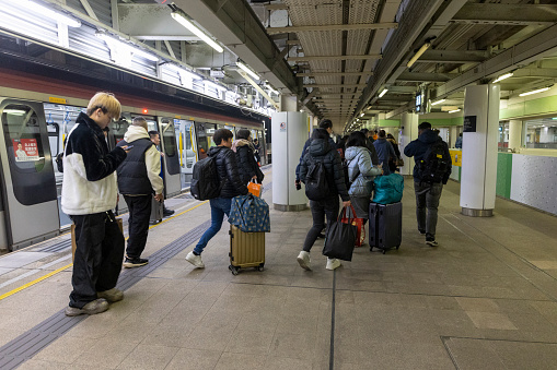 2024 Feb 12,Hong Kong.Citizens depart from Lo WU Station to return to mainland China after the Lunar New Year.