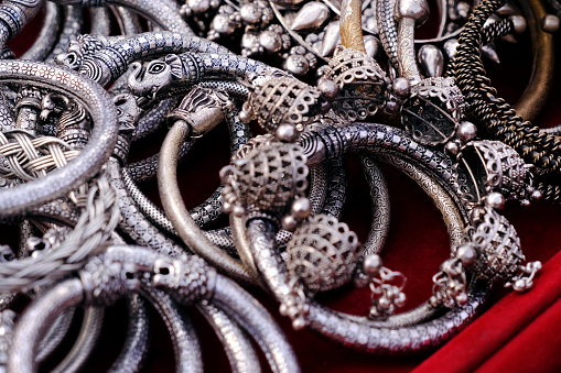 Designer oxidize bangles, Jerman Silver bangles, bangles made with metal, displayed in a shop.