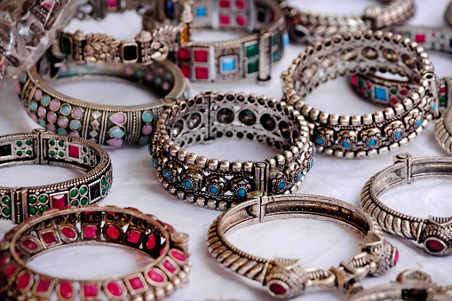 Designer oxidize bangles, Jerman Silver bangles, bangles made with metal, displayed in a shop.