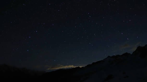 istock Starry night over a valley. Alpine winter night sky 2012006987