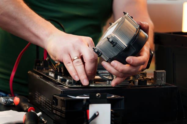 istock Close up of man repairing computer system unit 2012022771