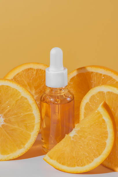 istock A bright and refreshing display of a Vitamin C serum bottle alongside fresh orange slices on orange background. Skincare 2012072021