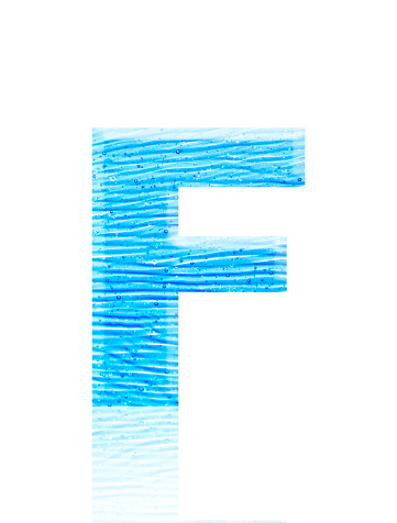 Close-up of three-dimensional blue water waves alphabet letter F on white background.