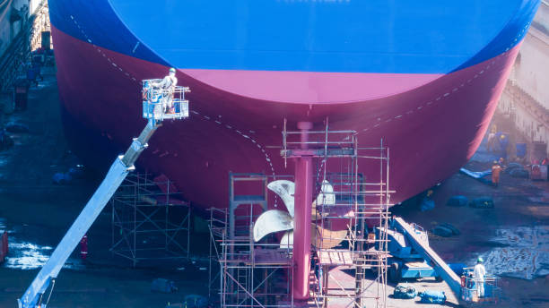 istock Cargo container ship at dry dock concept maintenance service. working at dry dock. Insurance and Maintenance Crude tanker Ship concept. Freight Forwarding Service maintenance Insurance. 2012113438