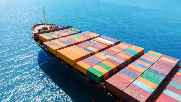 istock Stern of large cargo ship import export container box on the ocean sea on blue sky back ground concept transportation logistic and service to customer and supply change, webinar banner 2012113960