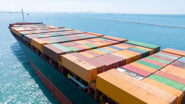 istock Stern of large cargo ship import export container box on the ocean sea on blue sky back ground concept transportation logistic and service to customer and supply change, webinar banner 2012114360