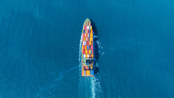 istock Stern of large cargo ship import export container box on the ocean sea on blue sky back ground concept transportation logistic and service to customer and supply change, webinar banner 2012114467