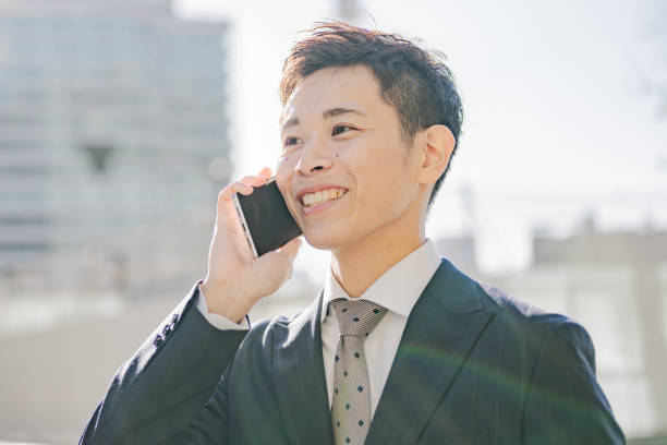 istock Urban tokyo and businessman with phone 2012142000